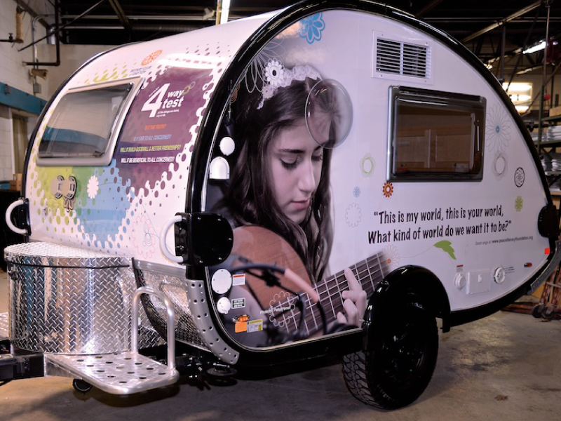 Custom graphics for non-standard vehicles including trailers and promotional rigs